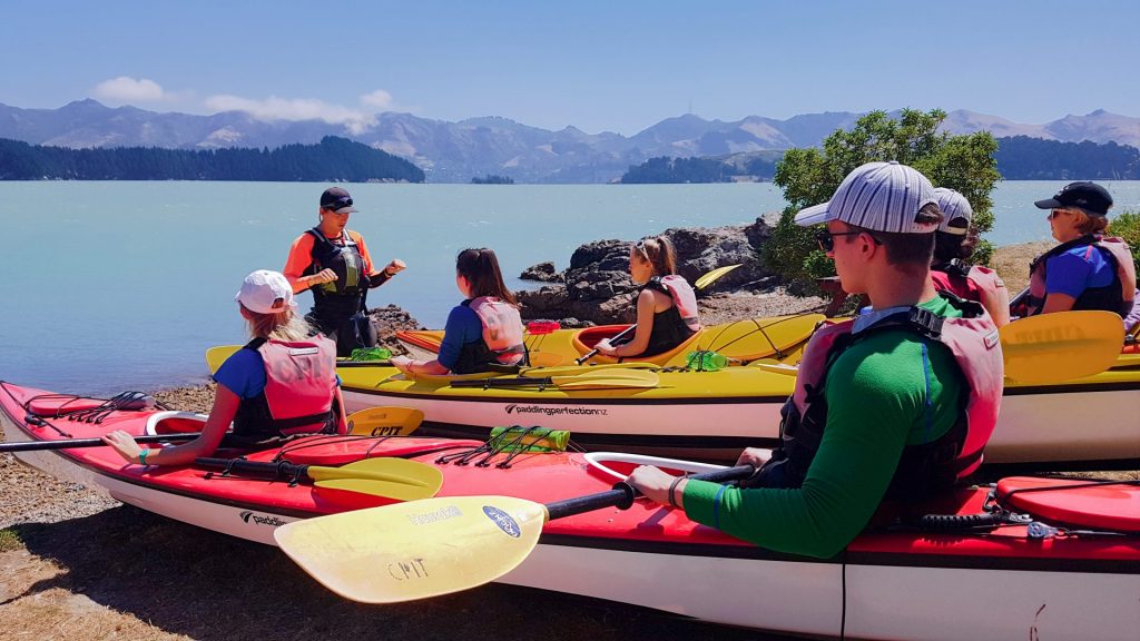 Learning to paddle on OENZ training course in New Zealand